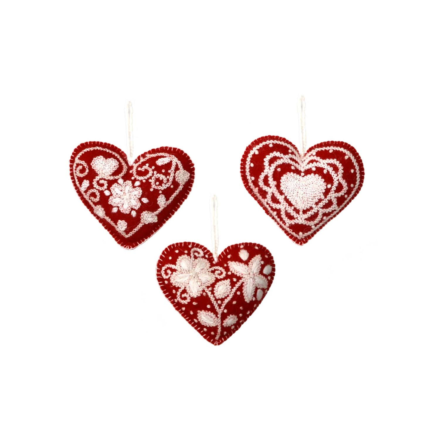 three red embroidered hearts